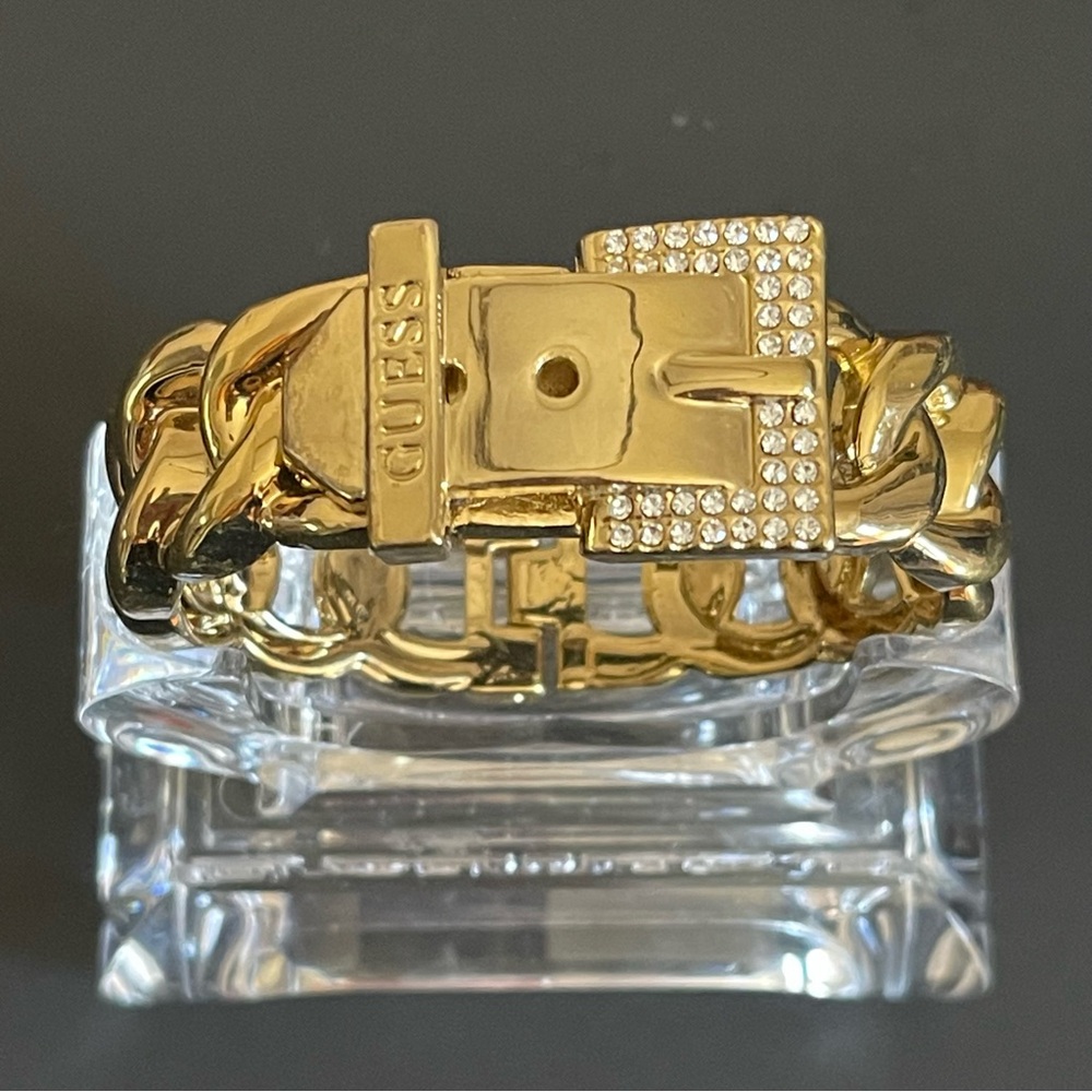 Guess gold tone crystal buckle design bangle bracelet.